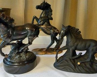 Bronze and wood horse statues