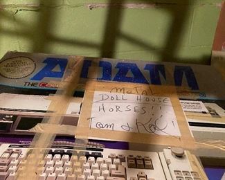I was super stoked that there was a Colecovision Computer in this box until I read the note. Thank goodness I like doll house horses just as much!