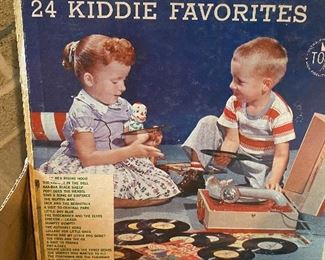 This little dude is trying to mac on this chick with his smooth jazz 45 collection but she just wants to listen to Cindi Lauper and have fun. 