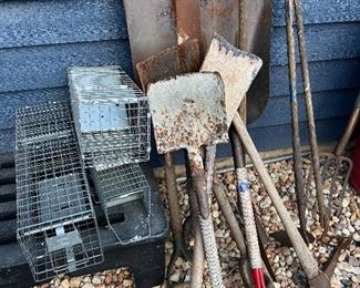 Yard garden tools, shovels, animal traps