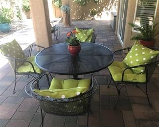 Briarwood Vintage Woodard Table with six chairs.  Sunbrella cushions are included.  It is in great condition!