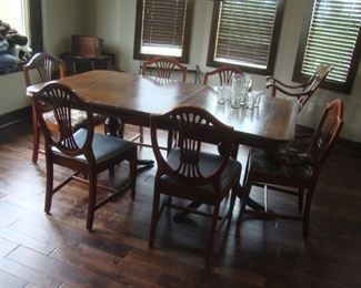 Duncan Phyfe double pedestal table with 6 harp back chairs