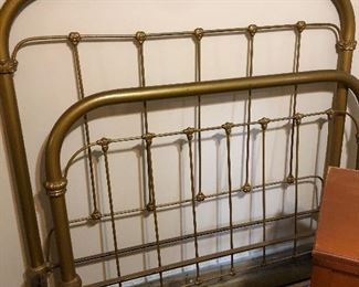 Vintage iron bed with the original rails