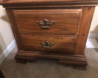 one of a pair of bedside tables