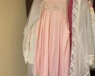 night gown with the pull of the bow on one shoulder, it falls to the ground