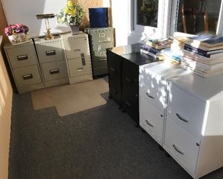 Two drawer filing cabinets: White set with build in wheels & two sets of keys - $40.00; Black set with wheel cart & one set of keys - $30.00; Grey set with no wheels & no keys - $20.00; Single Beige cabinet with one set of keys - $5.00; Single Dark Grey file cabinet with wheel cart & no keys - $7.00.