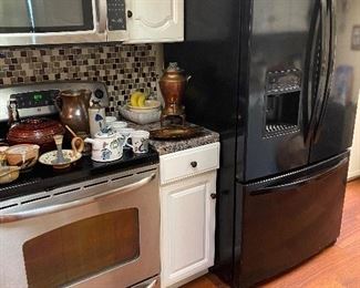 GE glass top 5 burner Range oven and Kenmore refrigerator also for sale 