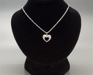 Sterling Silver, chain is 18". 3.2gtw