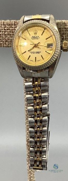 Marked Rolex Oysterquartz Datejust on the face; lots of scratches and wear. Is not running. Cannot Authenticate.
