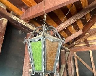 Wrought iron hanging lantern with stain glass panels gfrom 1960's...