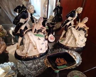 Two matching porcelain Figural Groups, courting couples.
