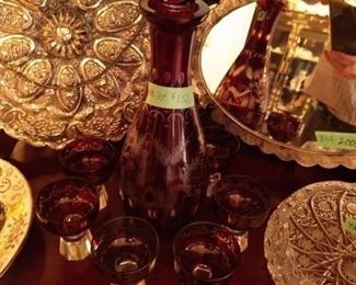 Evil Eye Mirrors, (3) and Ruby Glass Etched Bar Ware Decanter and 6 Cordial Glasses.
