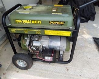 Gas Powered Emergency Electric Generator, 6,000. Watts regular output, pull direction, pneumatic air tires, asking $400. Obo.