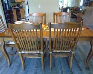 Dining table with six chairs. One chair not shown 