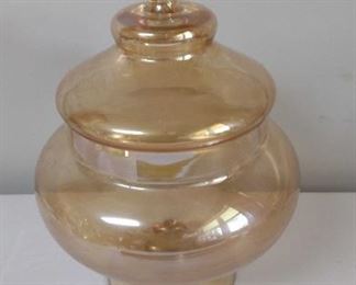 Marigold Carnival glass storage jar