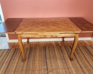Drop leaf desk...middle section is 29" high x 46" wide x 35" deep; two drop sides are each 9"