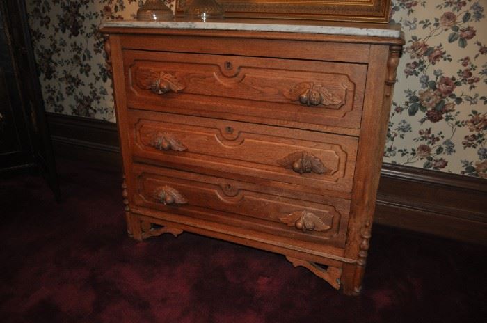 Three drawer marble top chest
