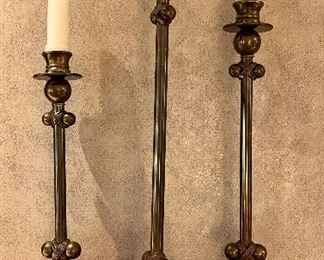 Item 56:  (3) Sweet Set of Brass Candlesticks: $75                                                                               Tallest - 17.5"