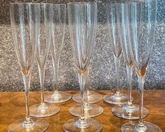 Item 106:  (9) Baccarat Champagne Glasses - 9.25":  $425