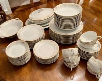 Item 168:  Noritake "Sedan" China:   $245                                                                            10 dinner plates, 10 salad plates, 8 bread & butter plates, 11 berry bowls, 12 soup bowls, 9 cups, gravy boat, covered tureen, serving bowl, creamer, (2) platters