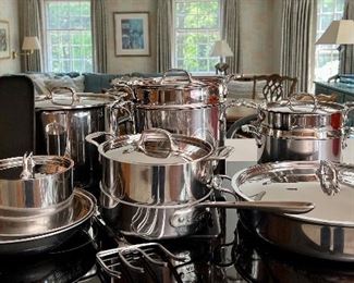 Item 175:  All Clad Set:  $645                                                                                                     pancake pan, (2) covered sauce pans, (2) saute pans, turkey forks, double boiler, double handled pan, stock with steamer, large stock pot & large covered saute pan