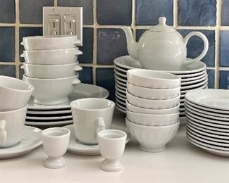 Item 177:  Aplico Dinnerware:  $150                                                                                       4 cups & 3 saucers, 27 salad plates, 2 egg cups, 4 soup bowls, 4 bowls with handles, 6 berry bowls, 4 bowls, teapot and 6 coffee cups