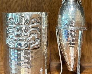 Item 130:  Mexican 925 Sterling Hand Hammered Cup (left):  $325                                                                                                      Item 131:  Mexican 925 Sterling Amphora on Stand (right):  $150                                                                                                  
Tallest - 5.5" 
