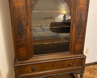 This old china cabinet (and matching buffet) were made by the Chicago Furniture Company. It has a tag on the back of the china cabinet but does not list a date. In has been in the family for over 50 years. The buffet shown in this listing is a mate to this cabinet. Price: $375.00
