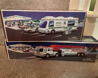 have several collectible  only displayed never played with   retro hess trucks in the original boxes -  