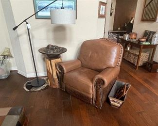 swivel -rocker -recliner- in leather-nailhead -and tooled design= matches sofa -  