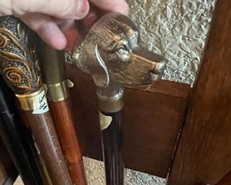 LOVE THIS collection of vintage canes- this one - is a dog handled -cane -SWORD !!    most likely by concord but no sticker remains- have  some with the sticker-  