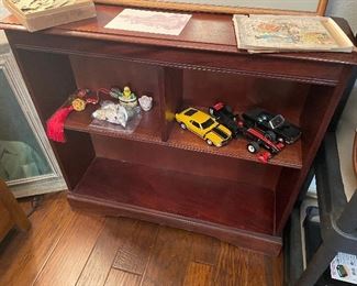  mustang cars- its a theme here !!     nice bookcase/shelf too 
