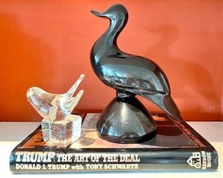 $10; glass bird figurine; $38; black, weighted, ceramic duck 