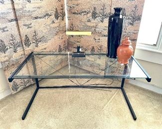 $200; glass and black metal desk with modern, sleek look; 62.5”w x 31” d x 29”h