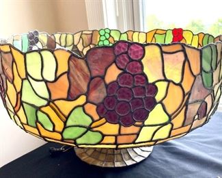 $250; Tiffany-style slag glass leaded art glass hanging lamp (small chip; as is) 24” d x 13”h. While this is designed to hang, we sorta like it as a bowl! :) 