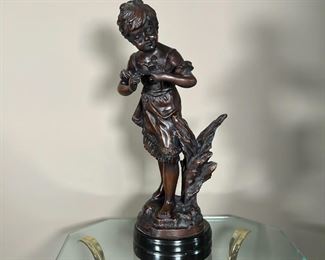 AUGUSTE MOREAU BRONZE SCULPTURE | Auguste Moreau signed bronze sculpture/statue of young girl holding a bird; h. 17-1/2 in.