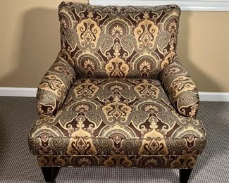 CUSTOM MADE ARM CHAIR | Paisley print armchair with two brass casters on the front legs, custom handcrafted by Lee Industries in the USA (armchair style 1573-01), with tag of authenticity signed by the cutter, sewer, upholsterer, trimmer, and inspector; h. 35 x 38 x 35 in.