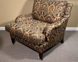 CUSTOM MADE ARM CHAIR | Paisley print armchair with two brass casters on the front legs, custom handcrafted by Lee Industries in the USA (armchair style 1573-01), with tag of authenticity signed by the cutter, sewer, upholsterer, trimmer, and inspector; h. 35 x 38 x 35 in.
