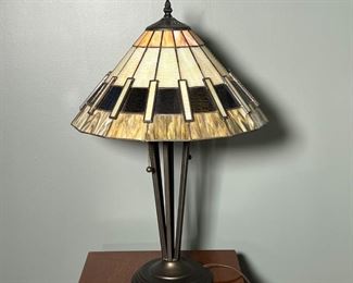 TIFFANY STYLE LAMP | Mission style table lamp by Quoizel Inc Style No. TF1260T, two bulbs with pull chains, on a joined four rod base; h. 23 in.

