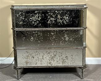 CURREY & Co. MIRRORED CHEST | Antiqued mirrored accent chest designed by Currey & Company, three drawer side table / nightstand accented with subtle horizontal lines between each drawer over tapering legs, can be used alone or as a pair (the other being sold separately); h. 31 x 17 x 32 in.