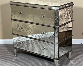 CURREY & Co. MIRRORED CHEST | Antiqued mirrored accent chest designed by Currey & Company, three drawer side table / nightstand accented with subtle horizontal lines between each drawer over tapering legs, can be used alone or as a pair (the other being sold separately); h. 31 x 17 x 32 in.