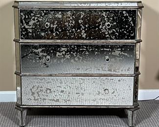 CURREY & Co. MIRRORED CHEST | Antiqued mirrored accent chest designed by Currey & Company, three drawer side table / nightstand accented with subtle horizontal lines between each drawer over tapering legs, can be used alone or as a pair (the other being sold separately); h. 31 x 17 x 32 in.