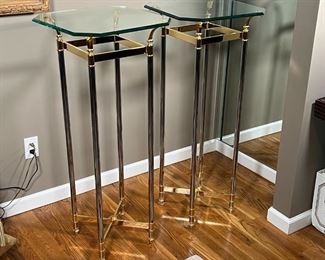 PAIR GLASS SIDE TABLES | Beveled glass side tables / pedestals, having octagonal tops over gold and chrome frames; each h. 41-3/4 x 18 x 18 in.
