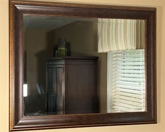 FRAMED WALL MIRROR | Beveled glass wall mirror with brown antiqued style wood frame; 37-1/2 x 48 in.