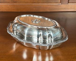 TIFFANY & Co. ENTREE DISH | Silver soldered lidded entree / serving dish by Tiffany & Co. Makers with braided edges; l. 11 in. [missing handle]