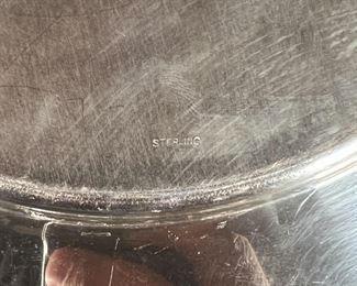 (2pc) STERLING SILVER PLATES | A pair of sterling silver round dishes with engraved central monogram "G" (dia. 11 in.); total weight 37.5 troy oz.
