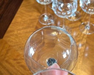 (6pc) WINE GLASSES | Six stemmed white wine glasses with a subtle ripple design to the bowls; h. 8-14 in.
