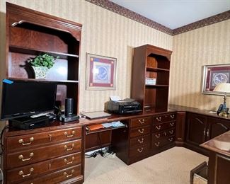 (5pc) OFFICE FURNITURE SET | Five section office furniture set including: pair of bookcase cabinets with shelves over double drawers (h. 78 x 30 x 22 in.), a middle section computer desk with pull out tray flanked by a bank of drawers (30 x 48 x 22 in.); a catty-corner surface section (30 x 22 x 22 in.), and a double door cabinet unit (30 x 30 x 22 in.)