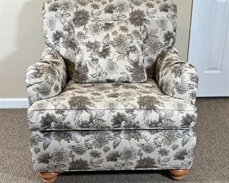 ETHAN ALLEN ARMCHAIR | Custom floral fabric upholstery and a matching pillow, with bun feet in the front; h. 34 x 31 x 34 in.
