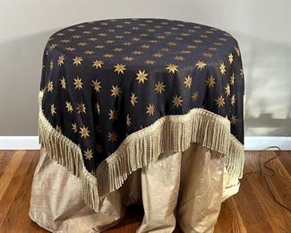 WOOD SIDE TABLE | Round wood top cafe / bistro-style side table with silver metal base, includes gold table cloth and brown cover with twisted cord fringe to create a skirted side table; h. 29 x 30 in.